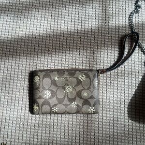 Coach Tan Wristlet with Snowflake Accents
